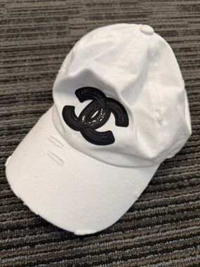White Cap with Black Emblem